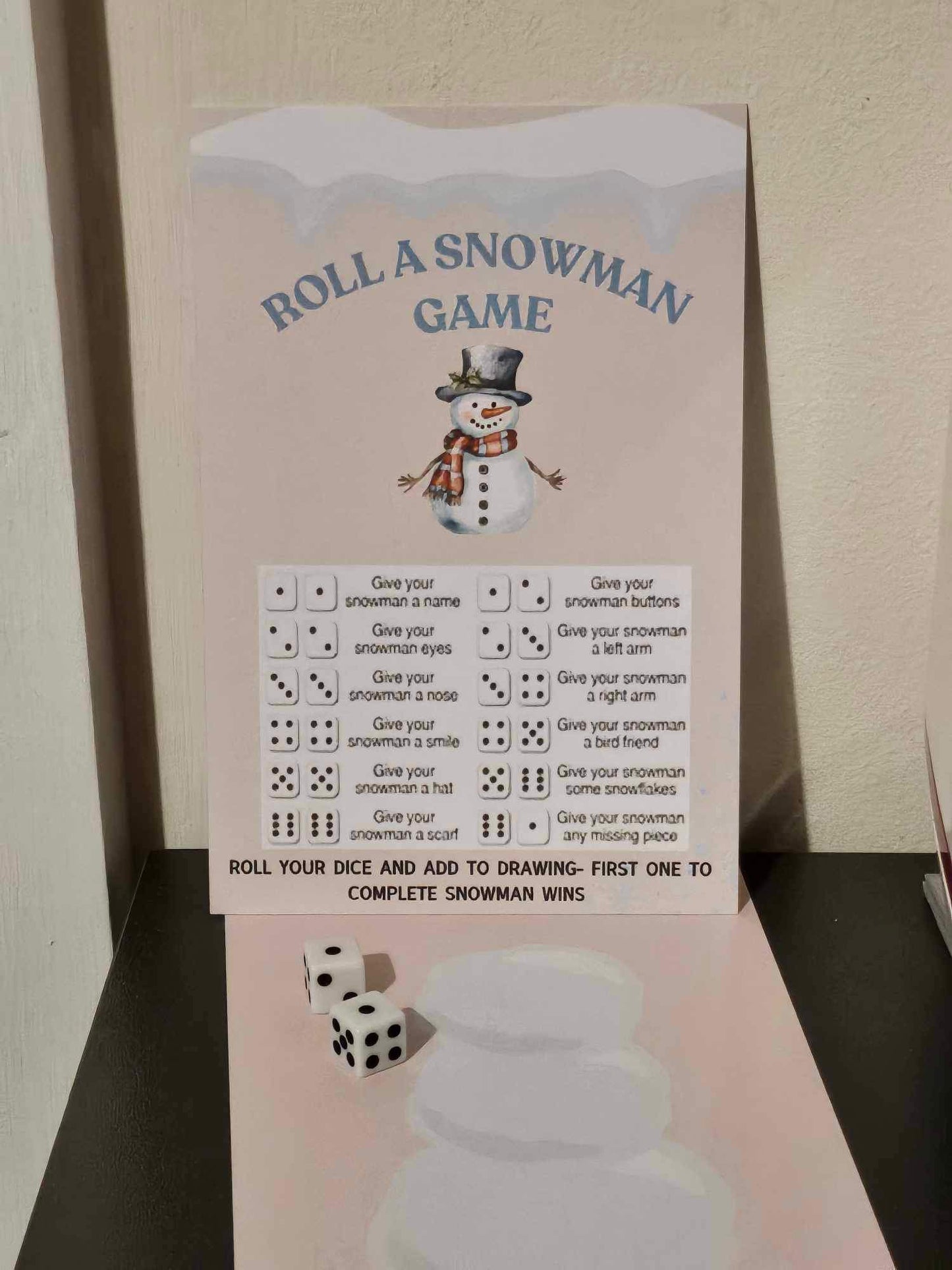 Roll A Snowman Game